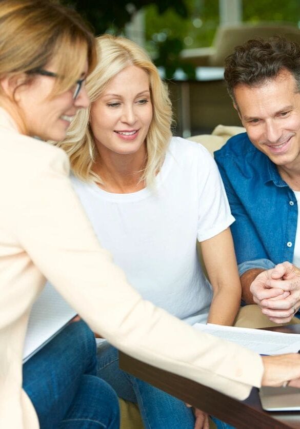 Shot of a middle aged couple consulting with their investment advisor their retirement savings plan.